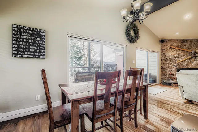 a bedroom with a large bed and flat tv