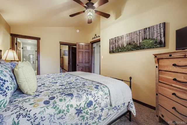 a view of a balcony dining table and chairs with wooden floor
