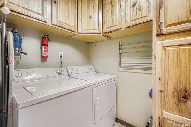 a front view of a building and car parked