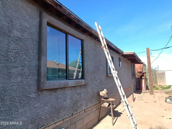 a view of a house with a snow on the wall