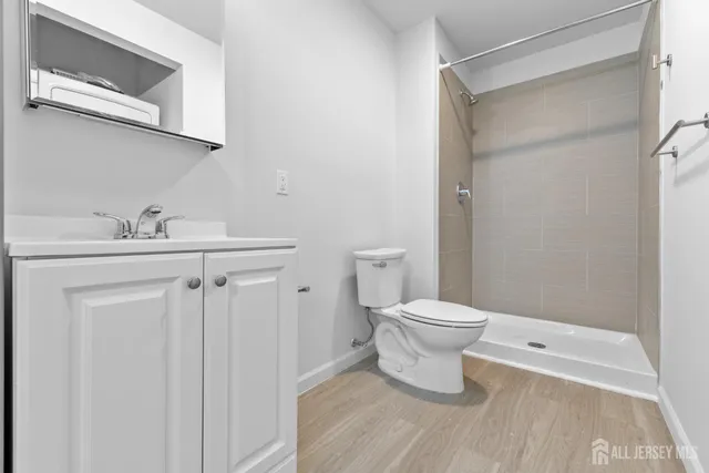 a bathroom with a toilet sink and tub