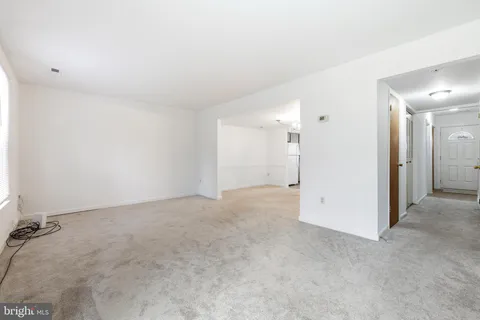 an empty room with a bathroom