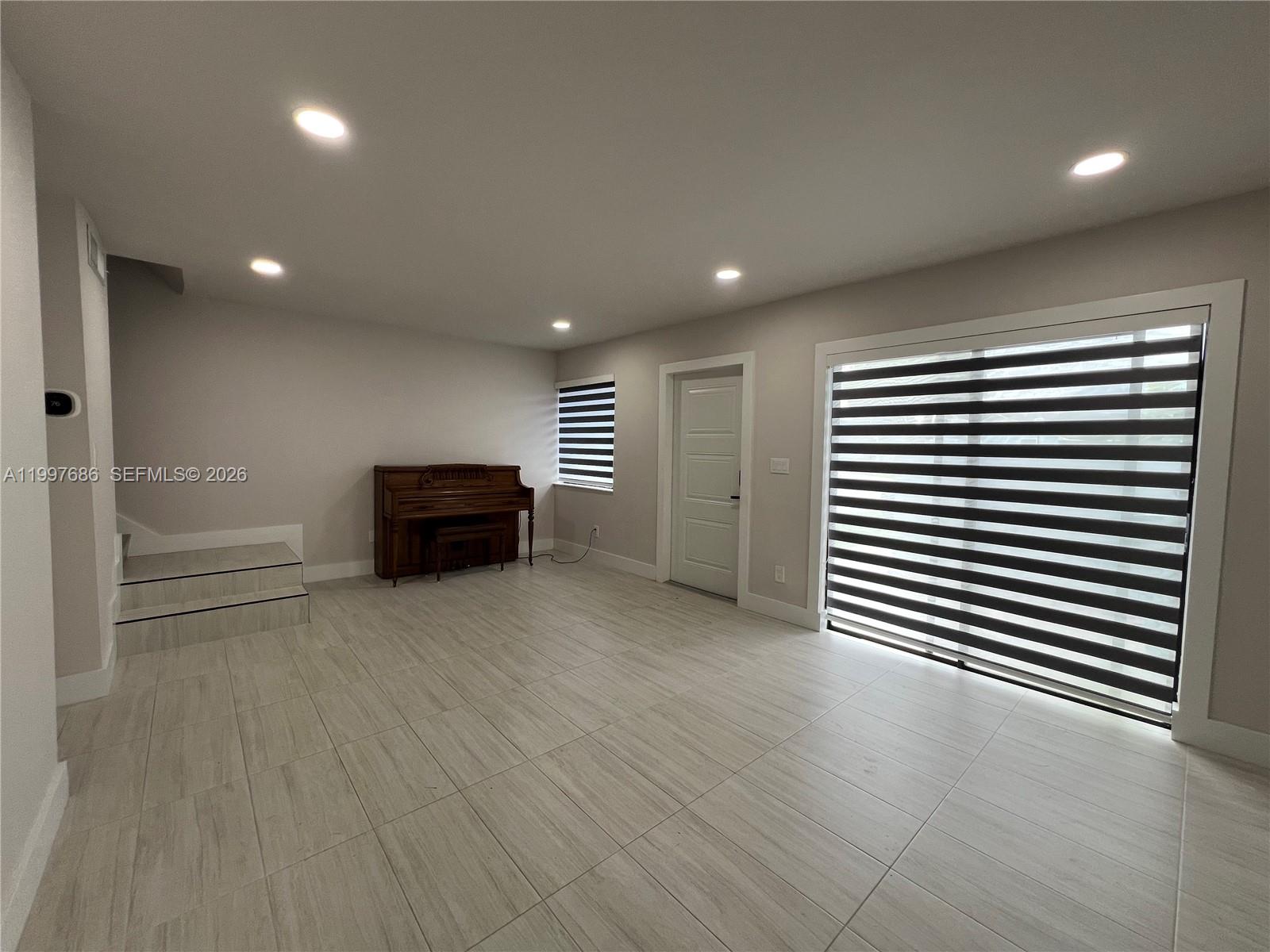 3826 Southwest 107th Avenue, Unit 22 Miami, FL 33165 - Photo 11 of 18 a view of livingroom with furniture and wooden floor