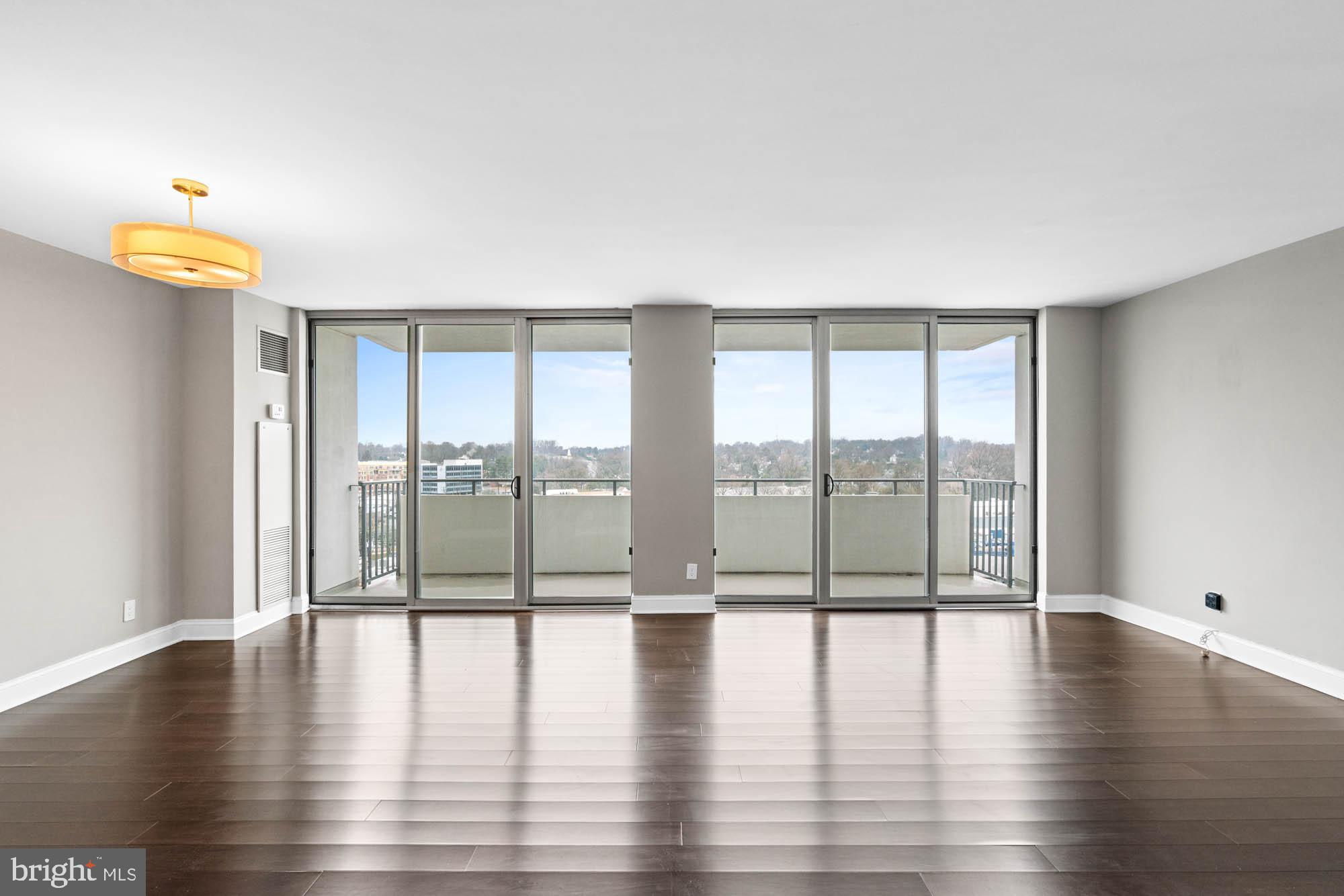 5101 River Road, Unit 1217 Bethesda, MD 20816 - Photo 12 of 61 Slider doors to patio