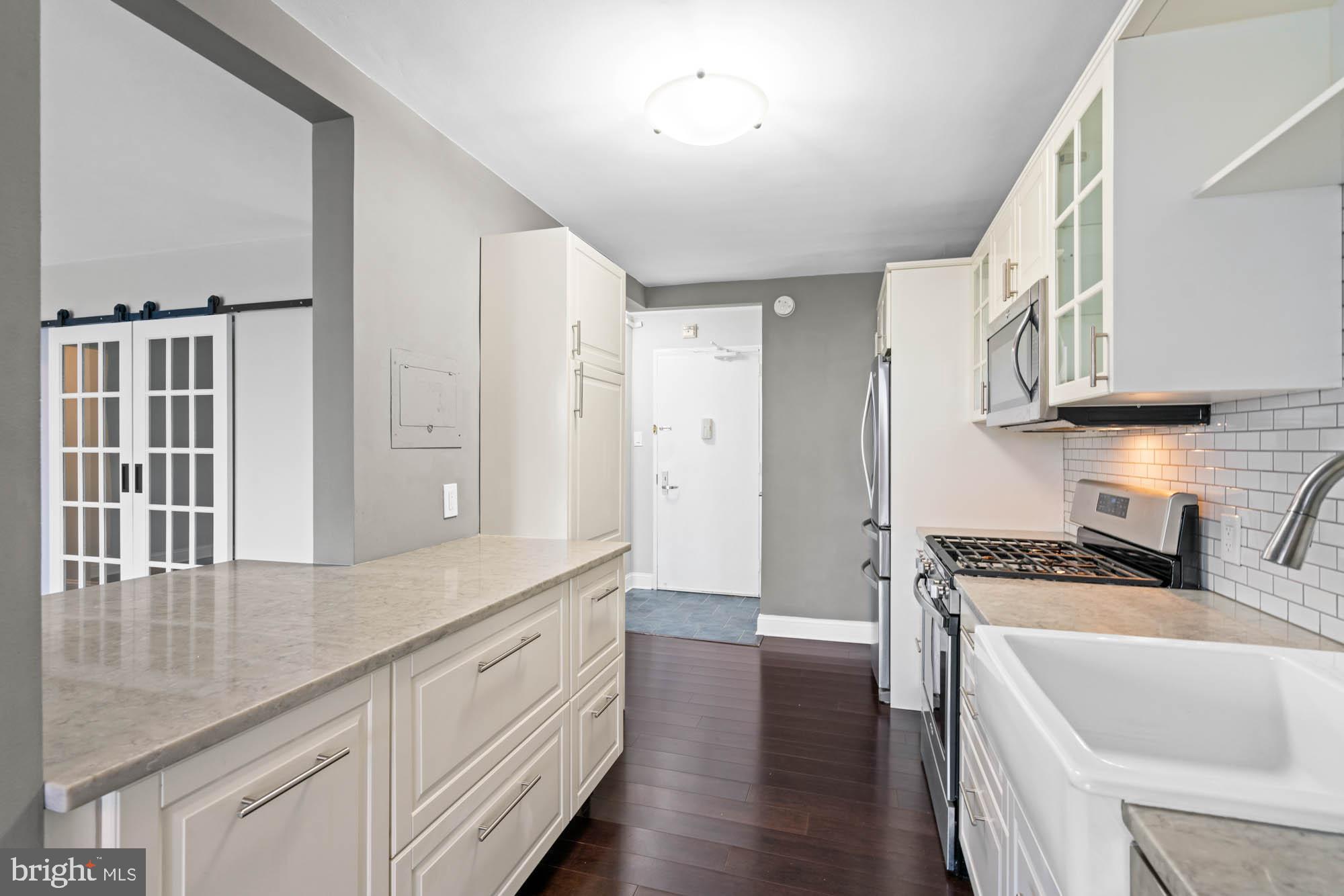 5101 River Road, Unit 1217 Bethesda, MD 20816 - Photo 17 of 61 White and cheery, renovated kitchen