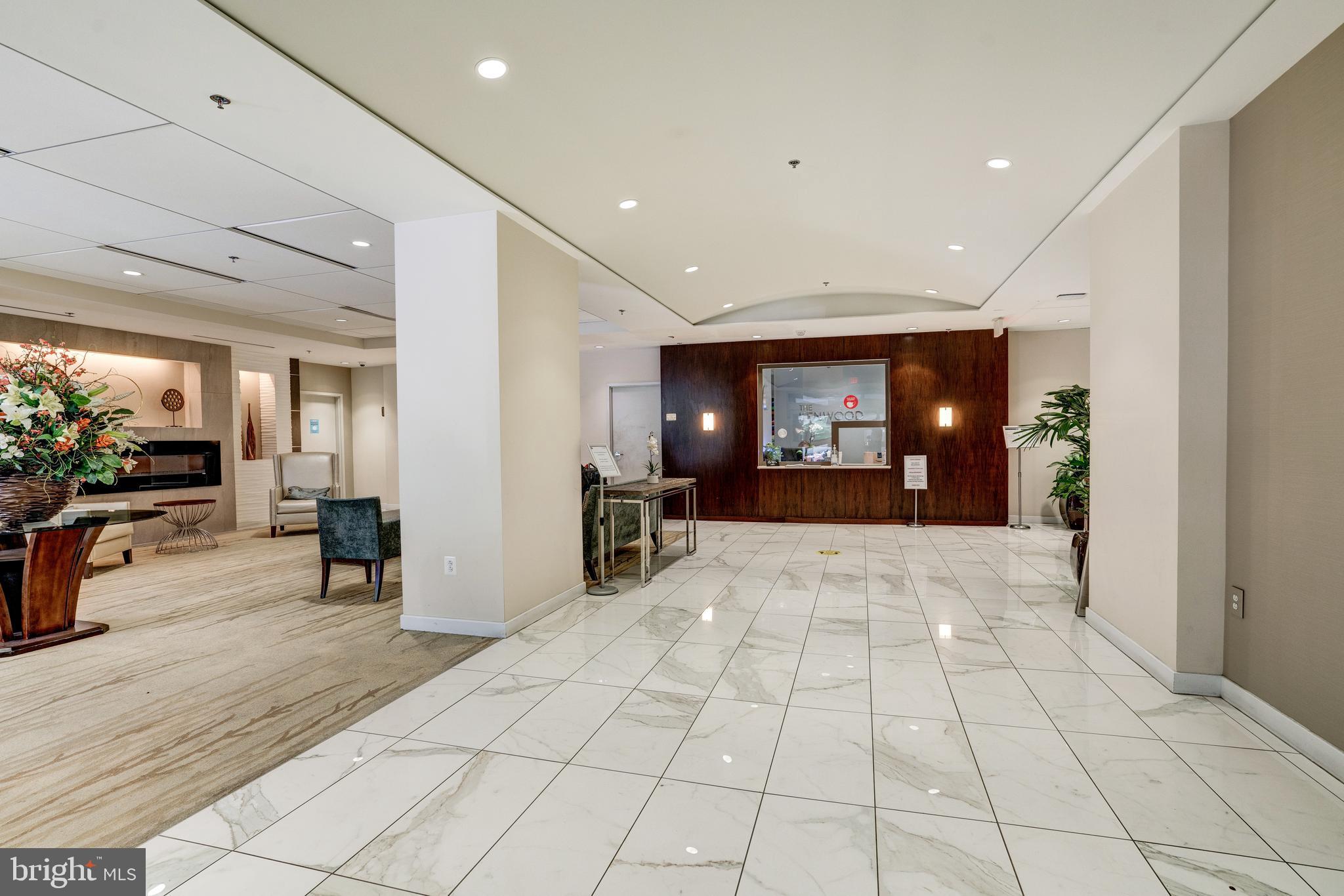 5101 River Road, Unit 1217 Bethesda, MD 20816 - Photo 5 of 61 Marble entrance and front desk