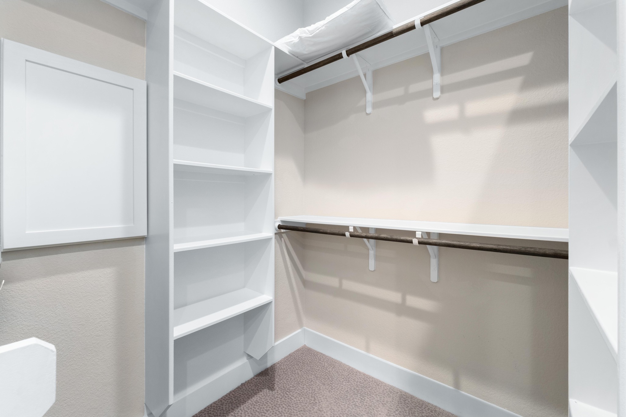 4323 Spicewood Springs Road, Unit 2 Austin, TX 78759 - Photo 15 of 30 Walk in closet with light colored carpet