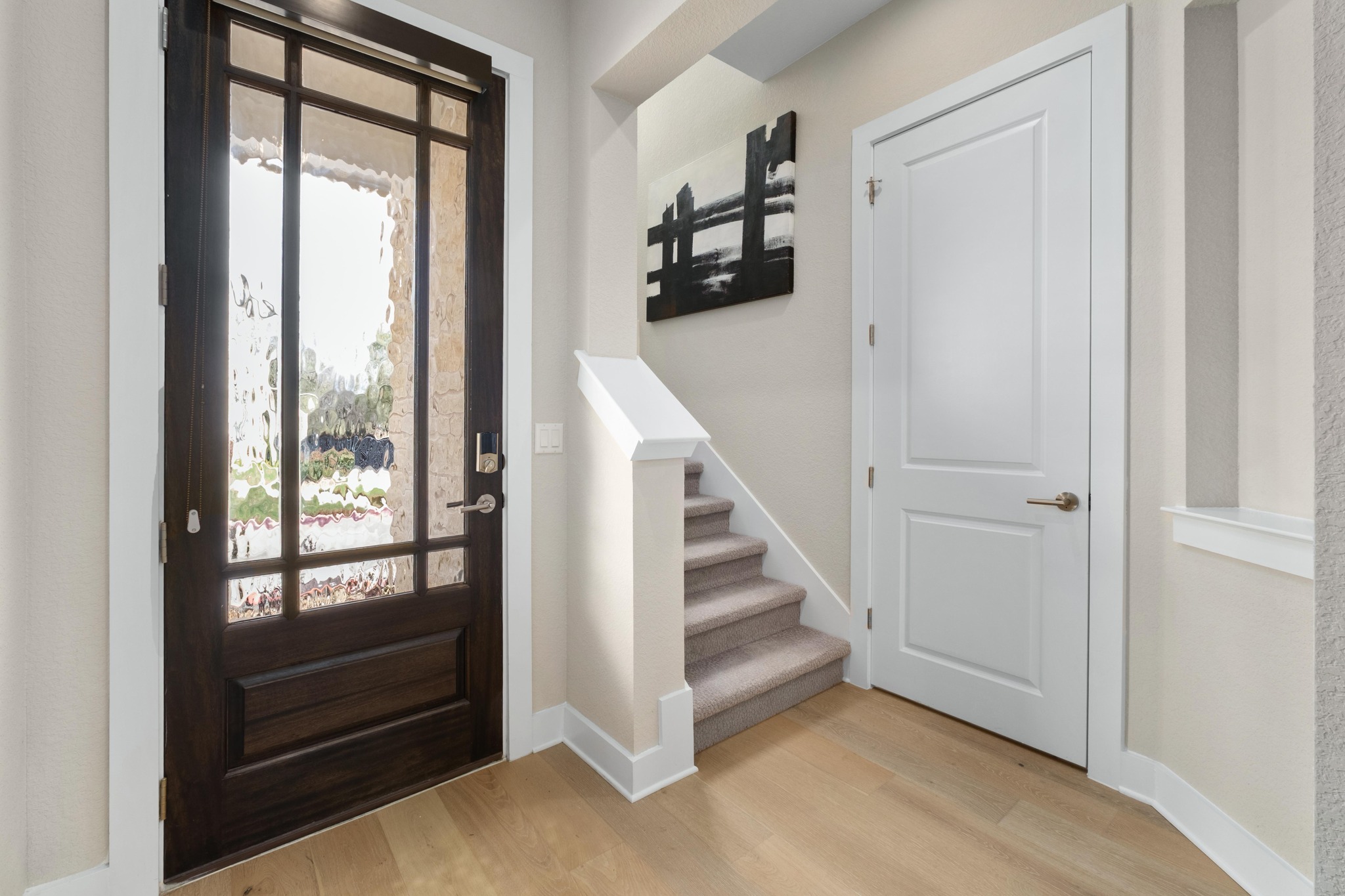 4323 Spicewood Springs Road, Unit 2 Austin, TX 78759 - Photo 16 of 30 Entryway with light wood-type flooring and stairs