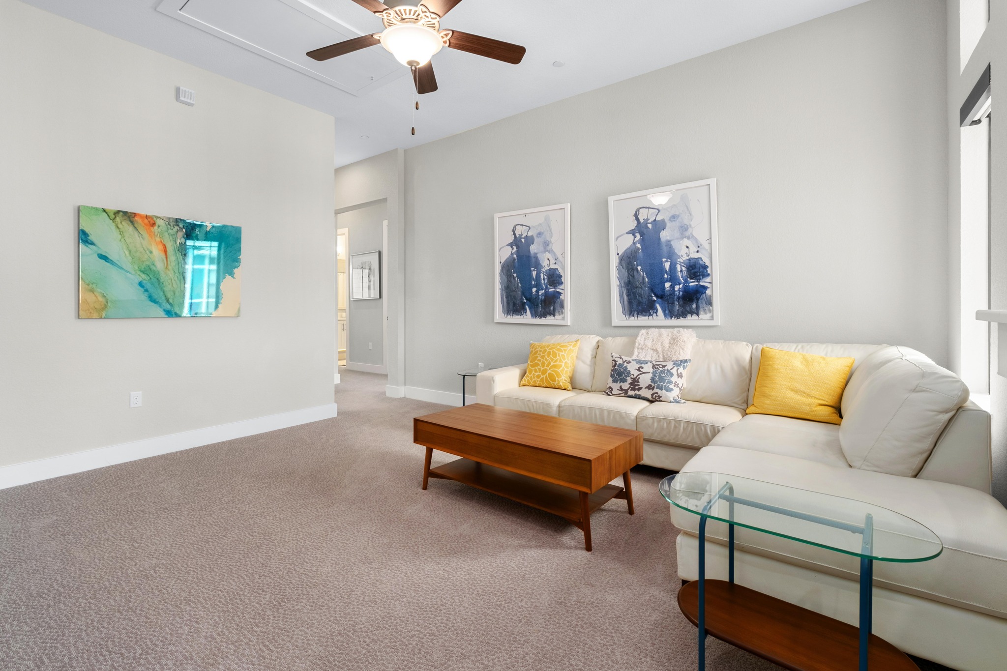 4323 Spicewood Springs Road, Unit 2 Austin, TX 78759 - Photo 18 of 30 Living room with ceiling fan and carpet flooring