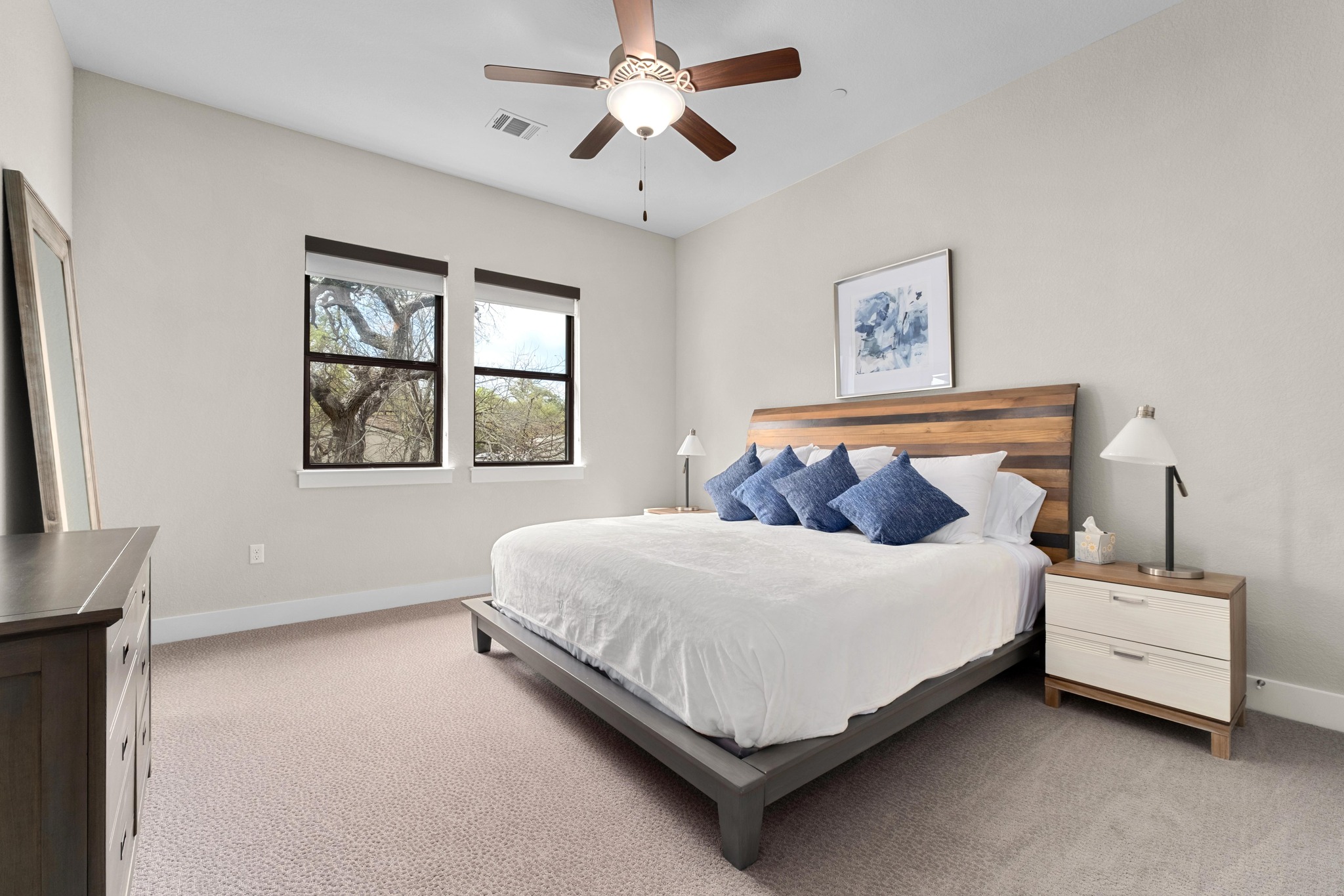 4323 Spicewood Springs Road, Unit 2 Austin, TX 78759 - Photo 20 of 30 Bedroom featuring light colored carpet and a ceiling fan