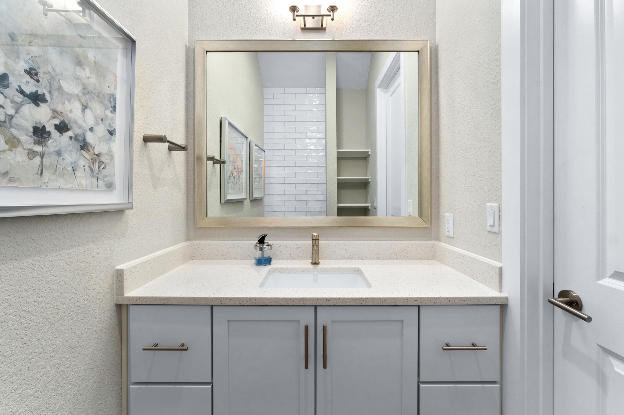 4323 Spicewood Springs Road, Unit 2 Austin, TX 78759 - Photo 22 of 30 Bathroom featuring a textured wall and vanity