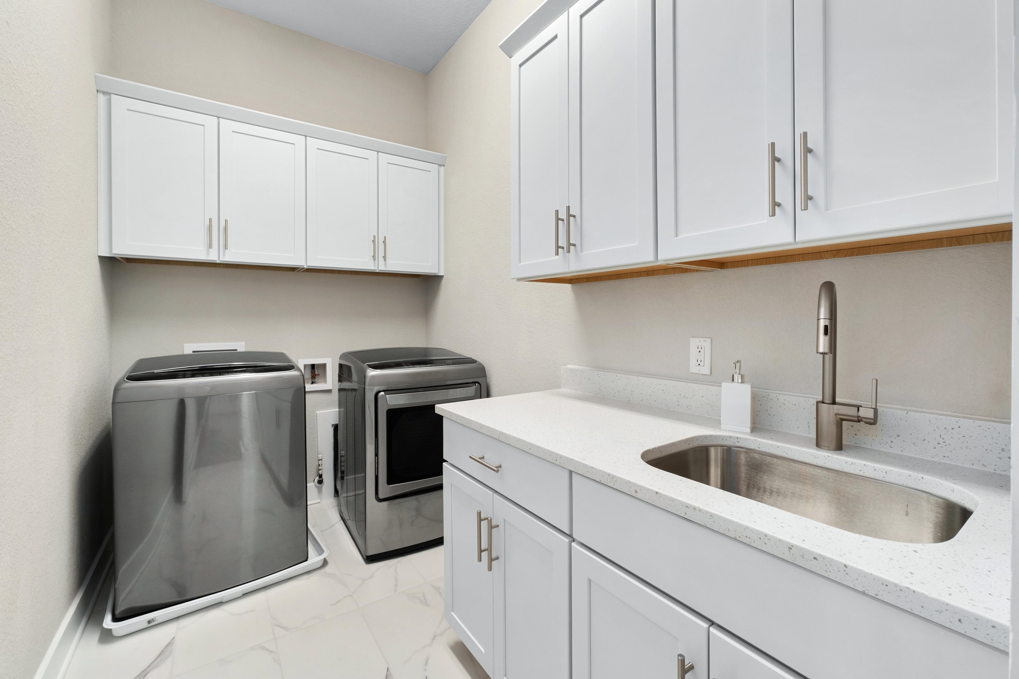 4323 Spicewood Springs Road, Unit 2 Austin, TX 78759 - Photo 23 of 30 Laundry area featuring cabinet space