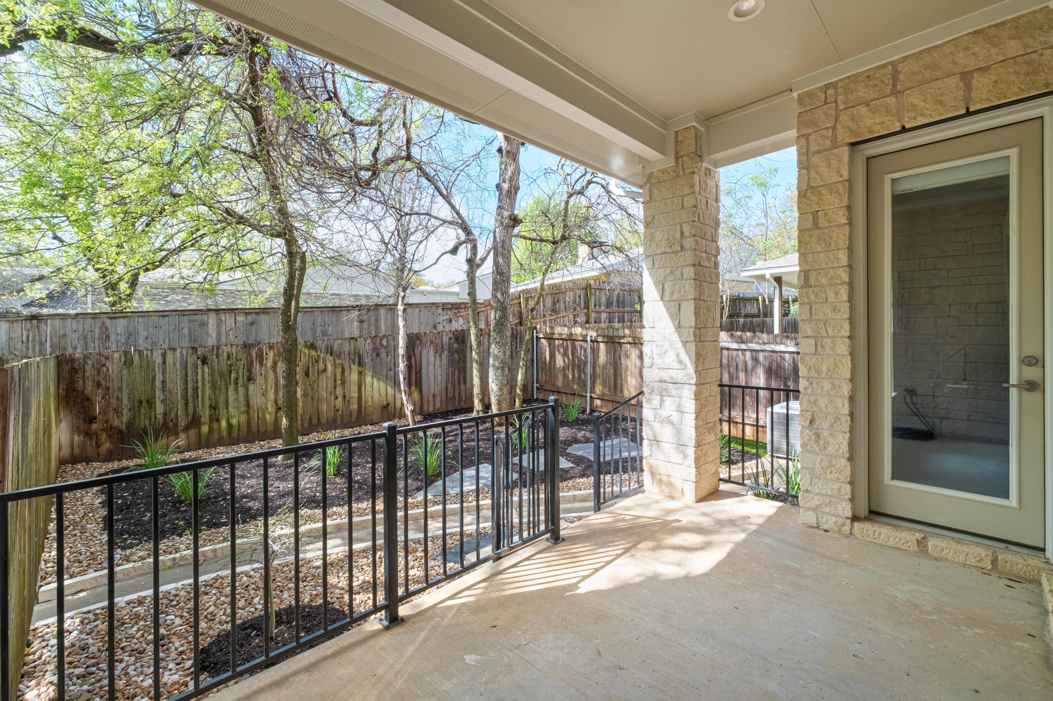 4323 Spicewood Springs Road, Unit 2 Austin, TX 78759 - Photo 24 of 30 Fenced backyard featuring a patio