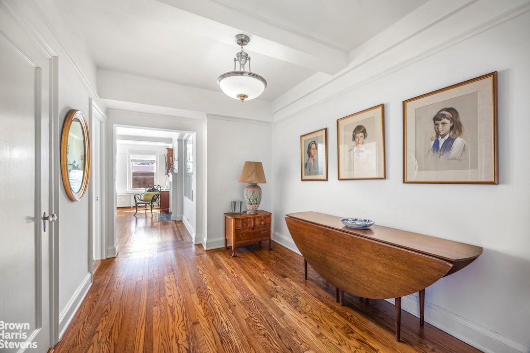 315 East 68th Street, Unit 13F Manhattan, NY 10065 - Photo 1 of 16 a view of a livingroom with furniture wooden floor chandelier and a chandelier