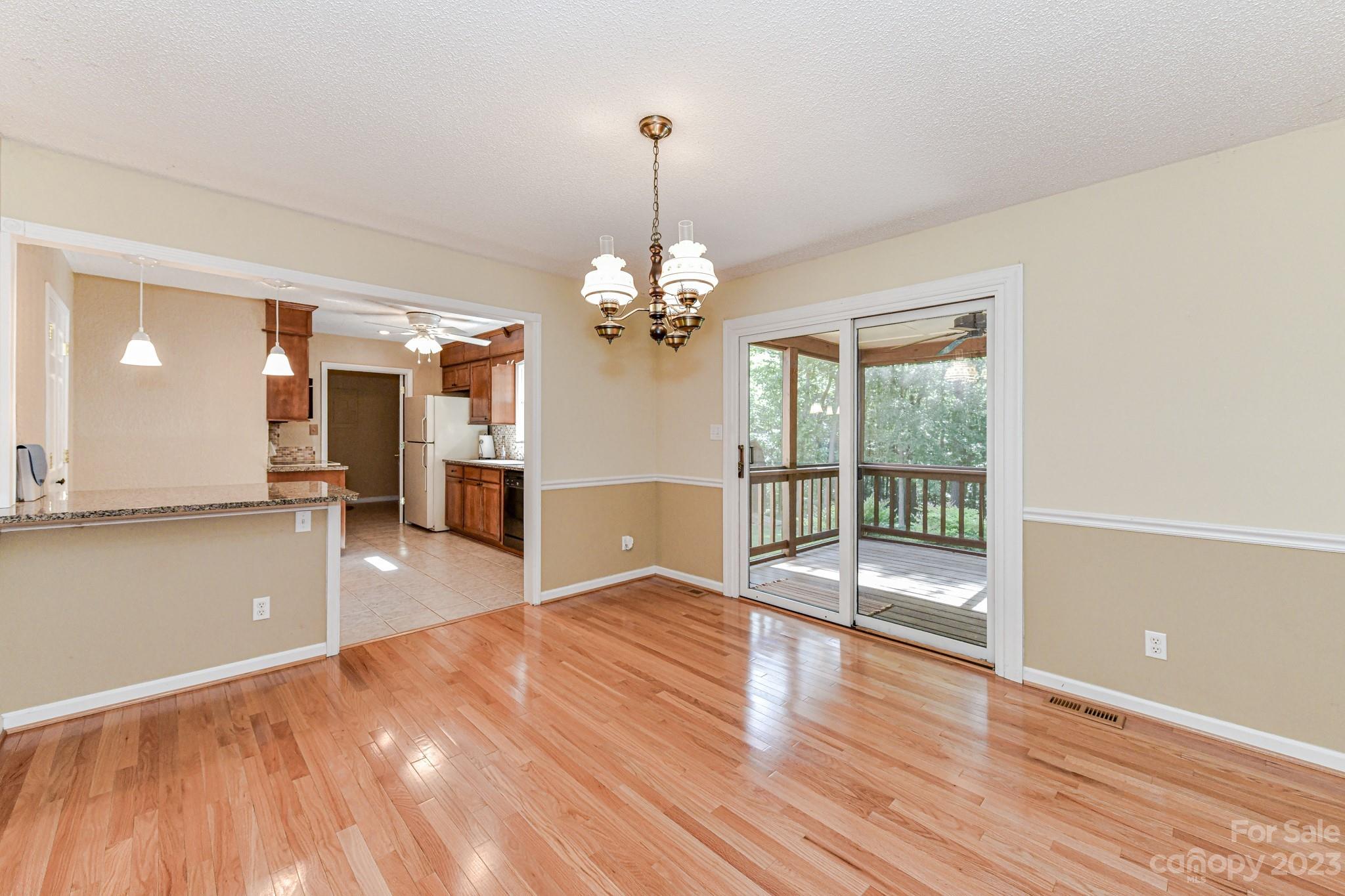 4690 Davidson Road Davidson, NC 28036 - Photo 12 of 29 a view of a room with wooden floor and balcony