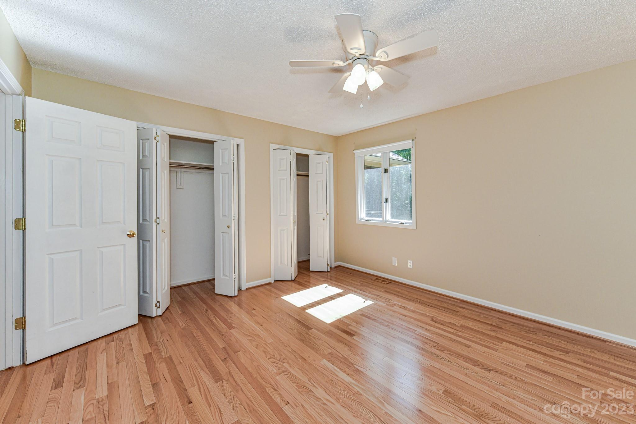 4690 Davidson Road Davidson, NC 28036 - Photo 20 of 29 a view of entryway with wooden floor