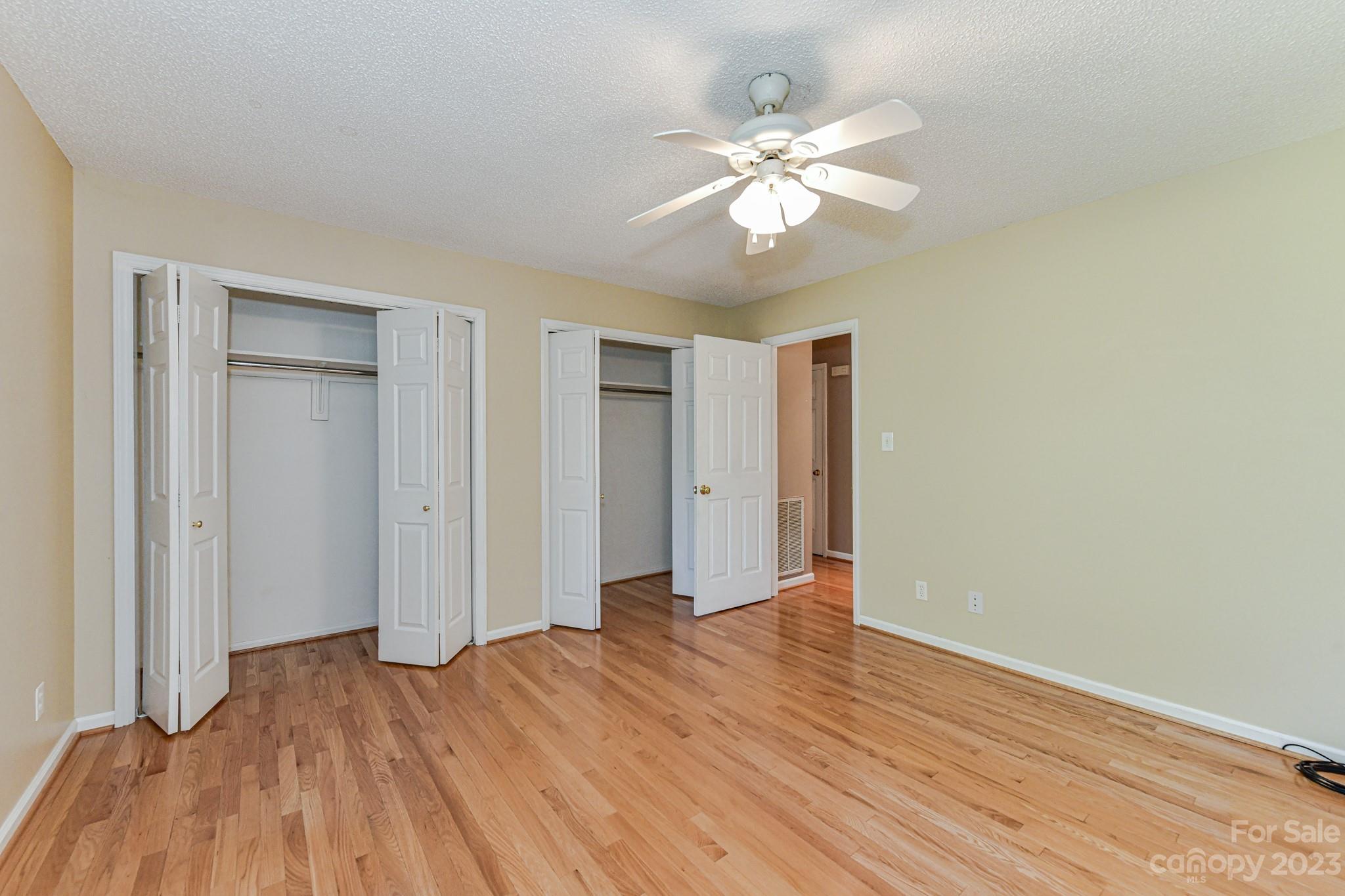 4690 Davidson Road Davidson, NC 28036 - Photo 23 of 29 a view of an empty room and wooden floor