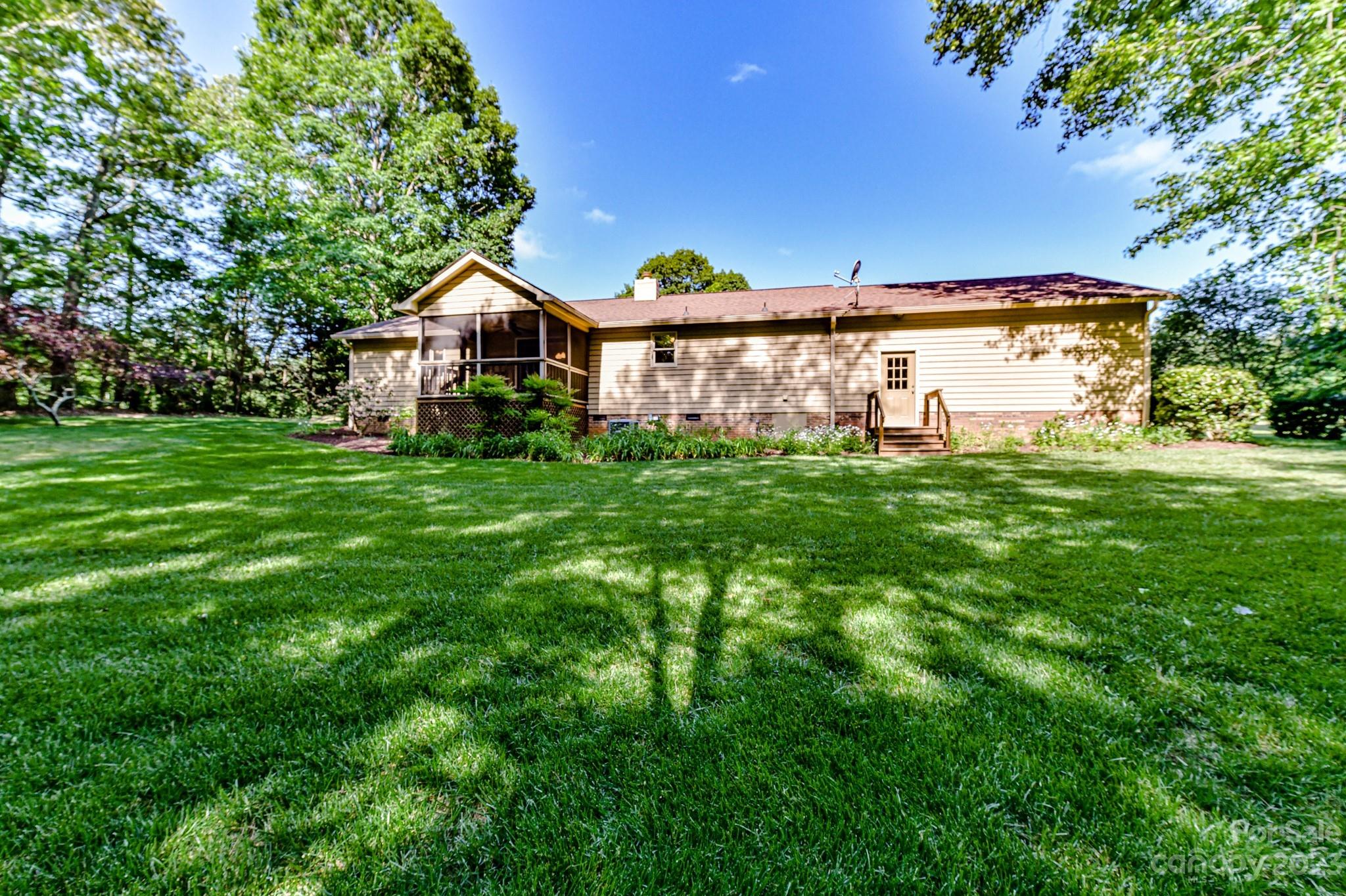 4690 Davidson Road Davidson, NC 28036 - Photo 28 of 29 a house view with a garden space