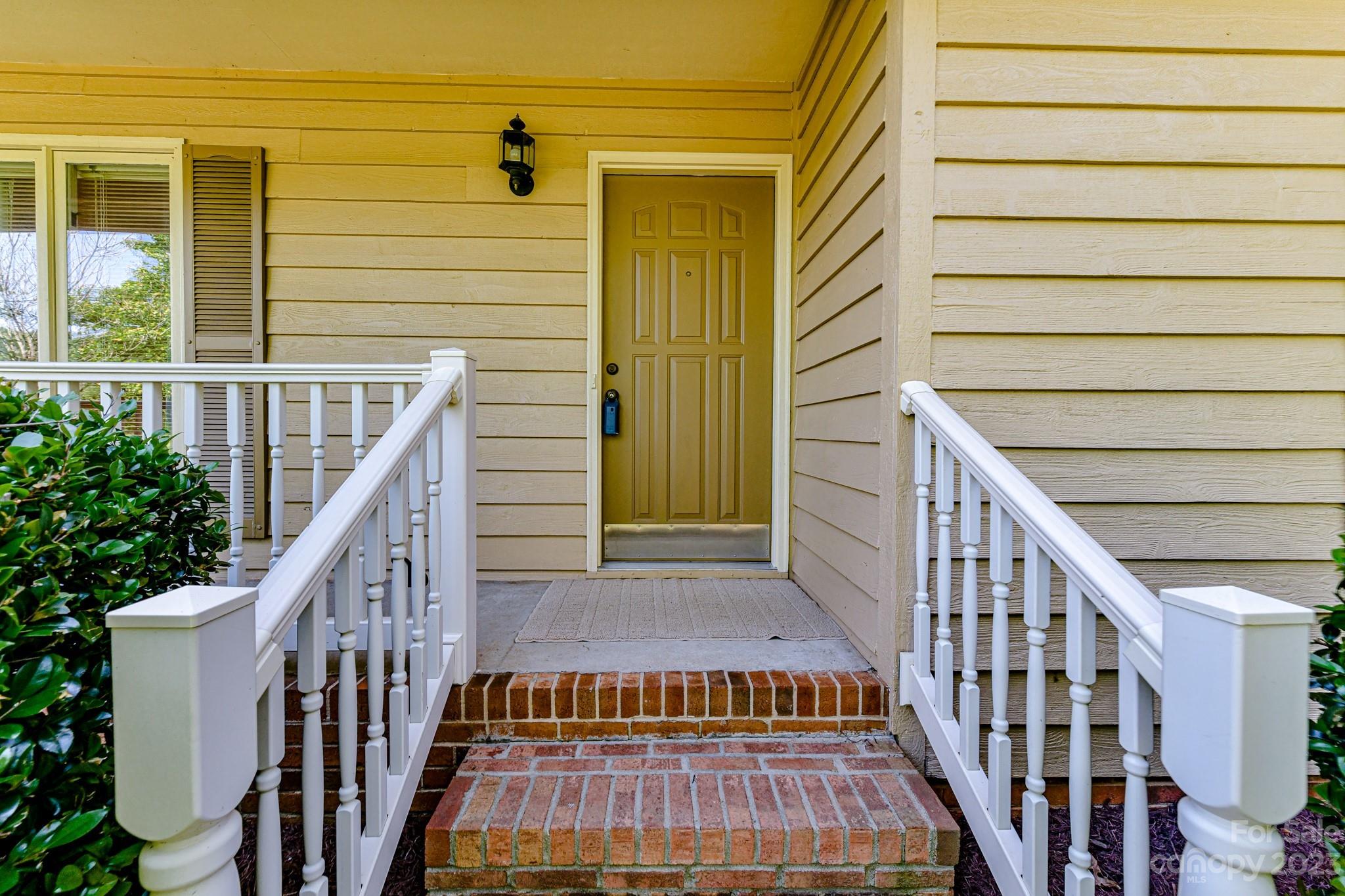 4690 Davidson Road Davidson, NC 28036 - Photo 4 of 29 a view of entryway with a front door