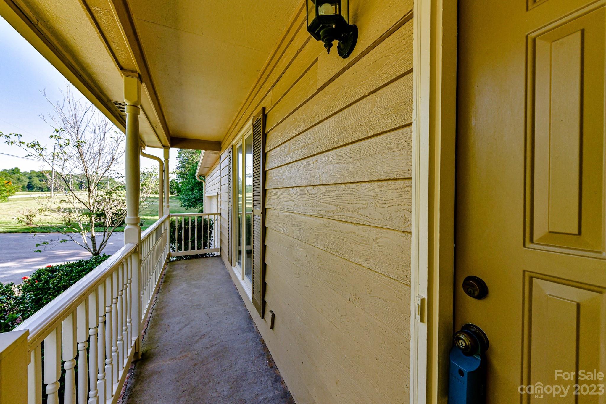 4690 Davidson Road Davidson, NC 28036 - Photo 5 of 29 a view of a house with wooden floor