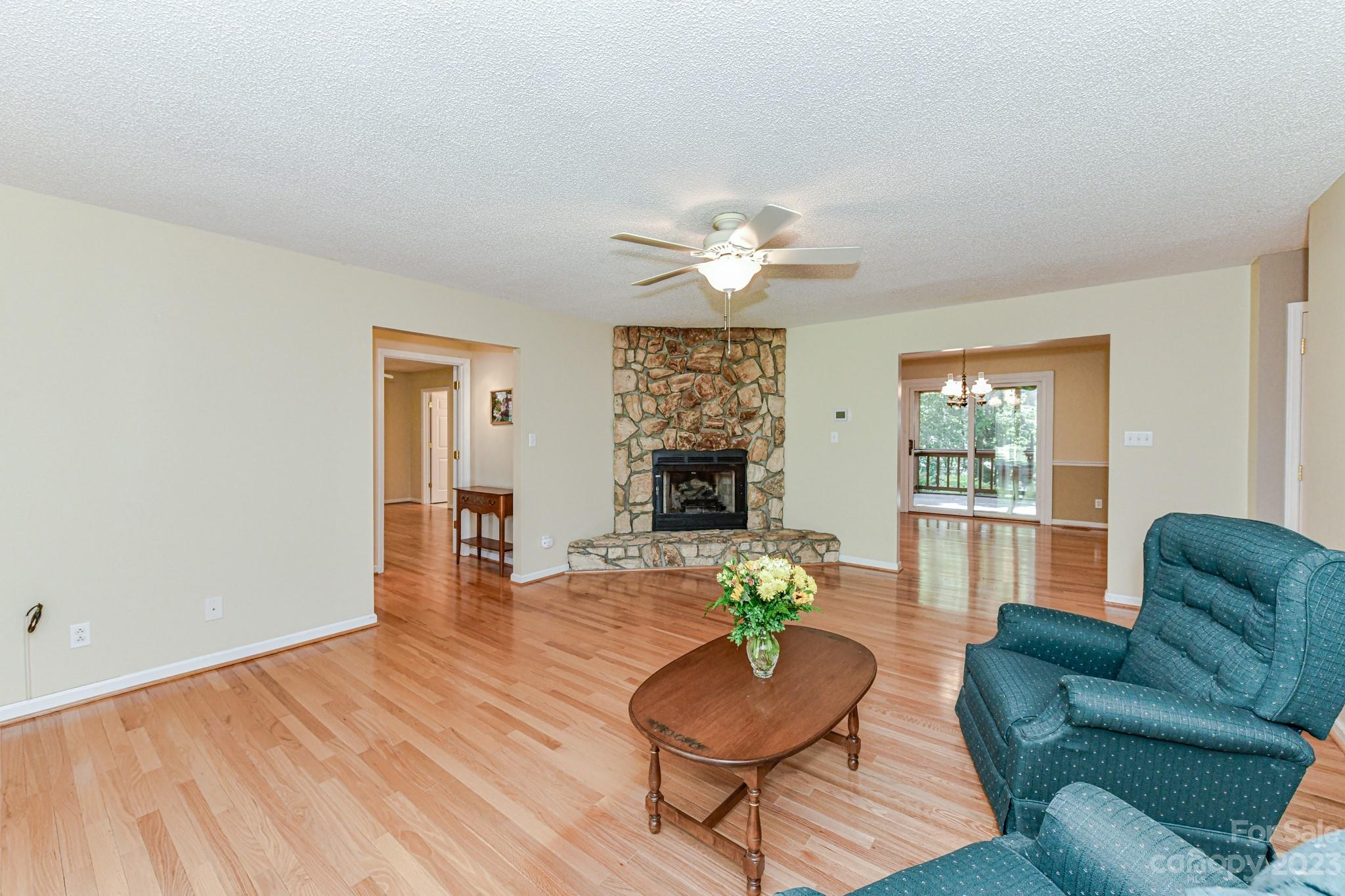4690 Davidson Road Davidson, NC 28036 - Photo 9 of 29 a living room with furniture and a wooden floor