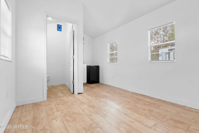 an empty room with windows