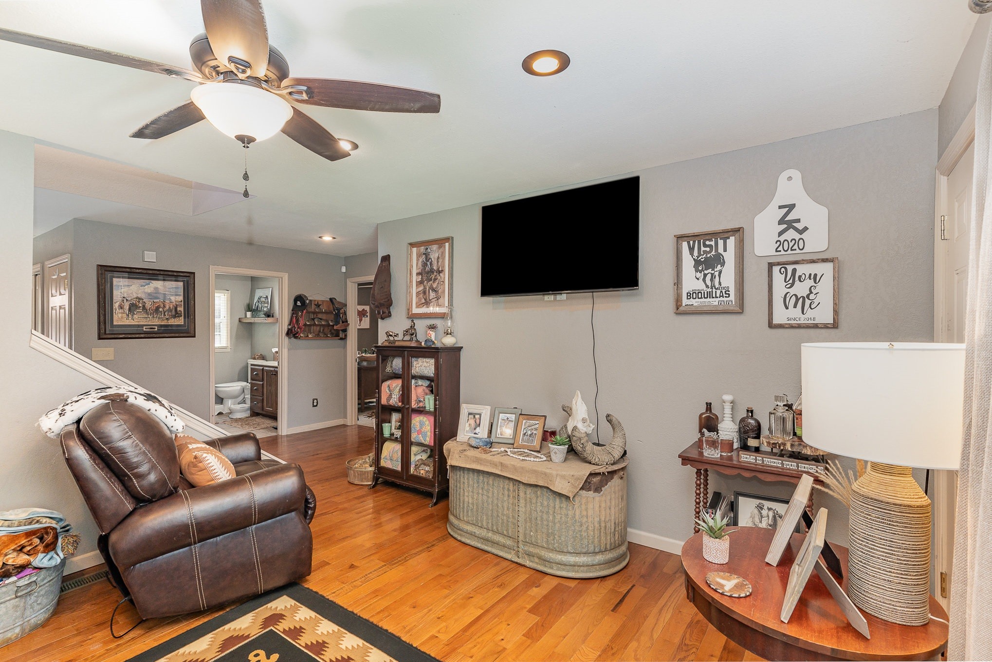 10919 Owens Chapel Road Springfield, TN 37172 - Photo 11 of 23 a living room with furniture and a flat screen tv