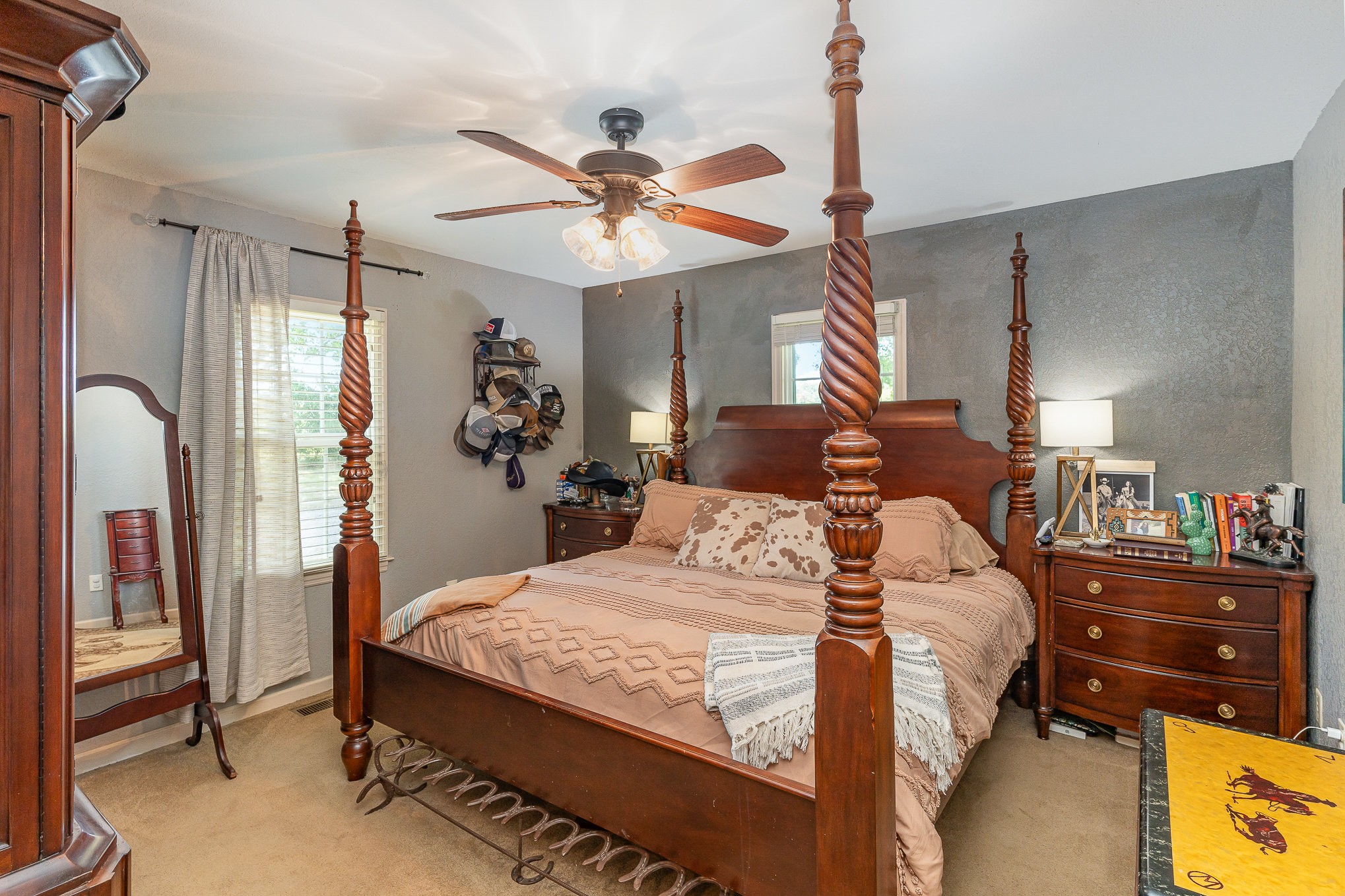 10919 Owens Chapel Road Springfield, TN 37172 - Photo 13 of 23 a bedroom with a bed and a chandelier