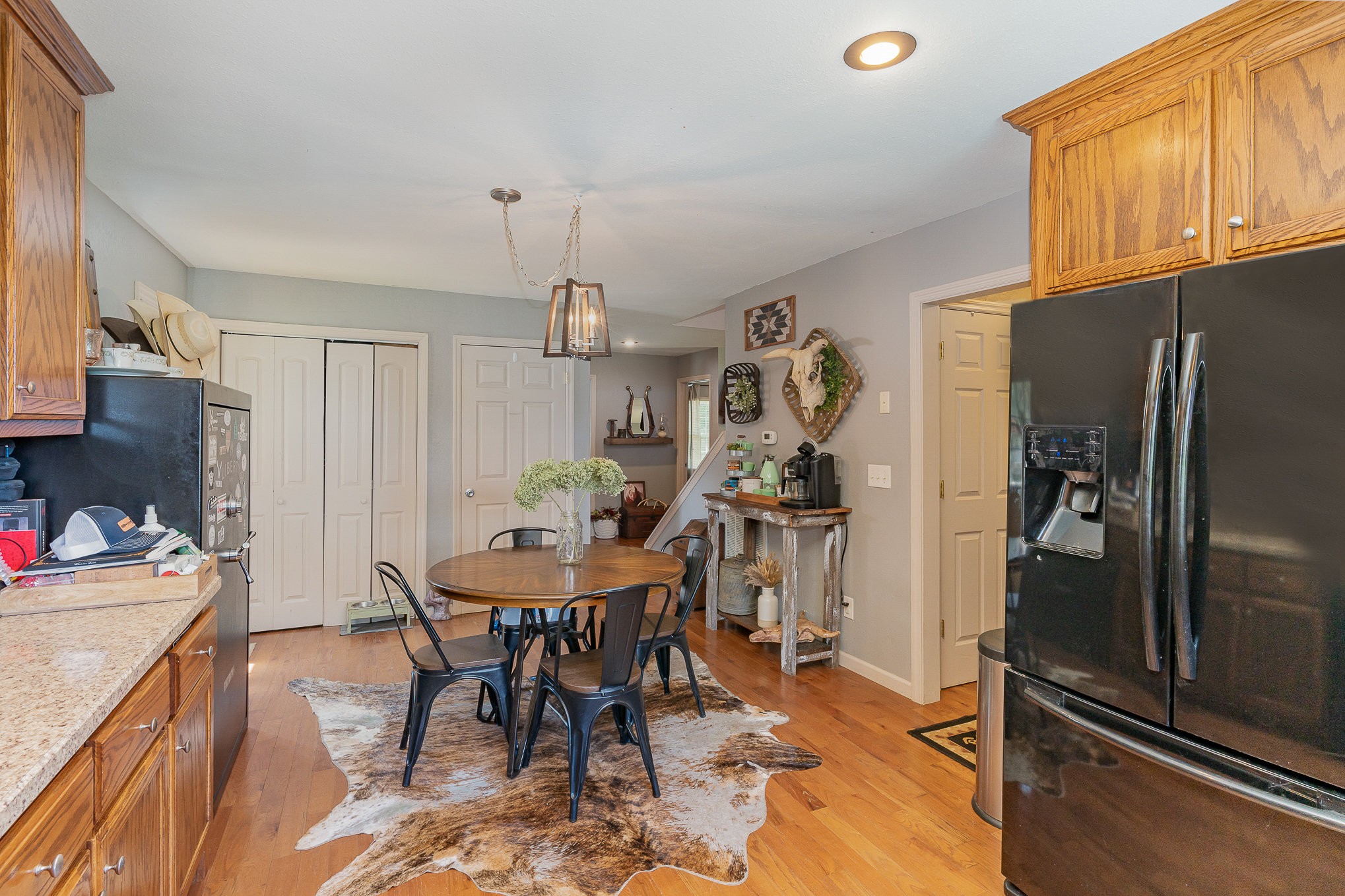 10919 Owens Chapel Road Springfield, TN 37172 - Photo 9 of 23 a view of a dining room with furniture window and wooden floor