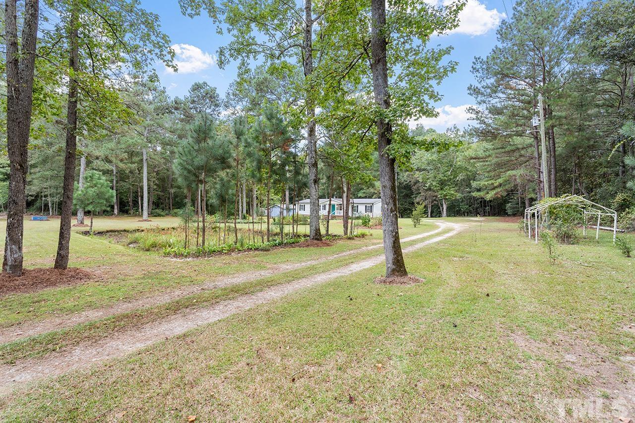 1002 Autry Road Lillington, NC 27546 - Photo 28 of 38 a view of a park with trees