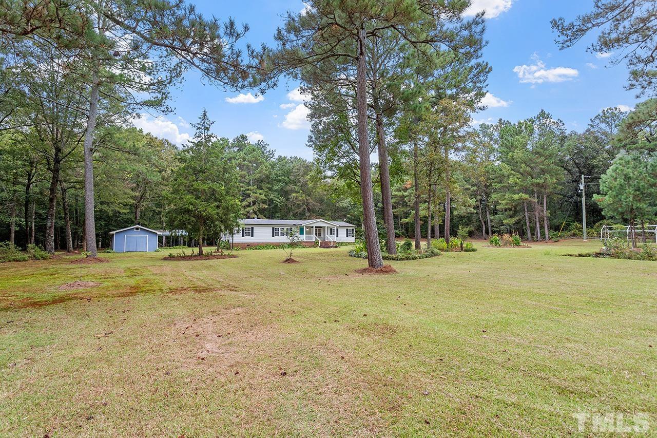 1002 Autry Road Lillington, NC 27546 - Photo 30 of 38 a view of a swimming pool with trees