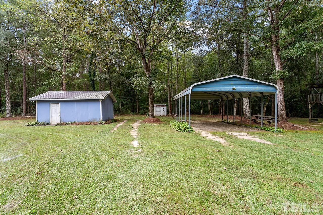 1002 Autry Road Lillington, NC 27546 - Photo 31 of 38 a view of a house with a yard