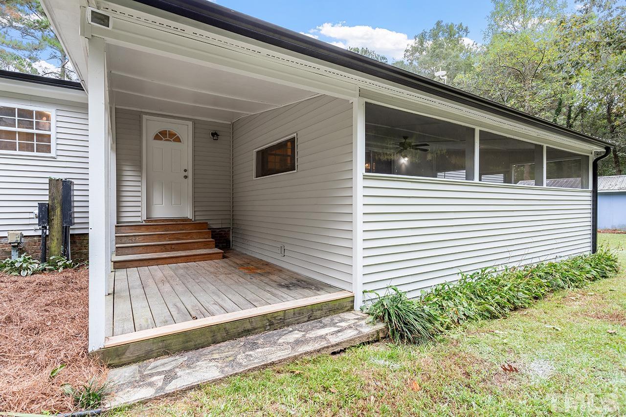 1002 Autry Road Lillington, NC 27546 - Photo 36 of 38 a view of a house with a yard