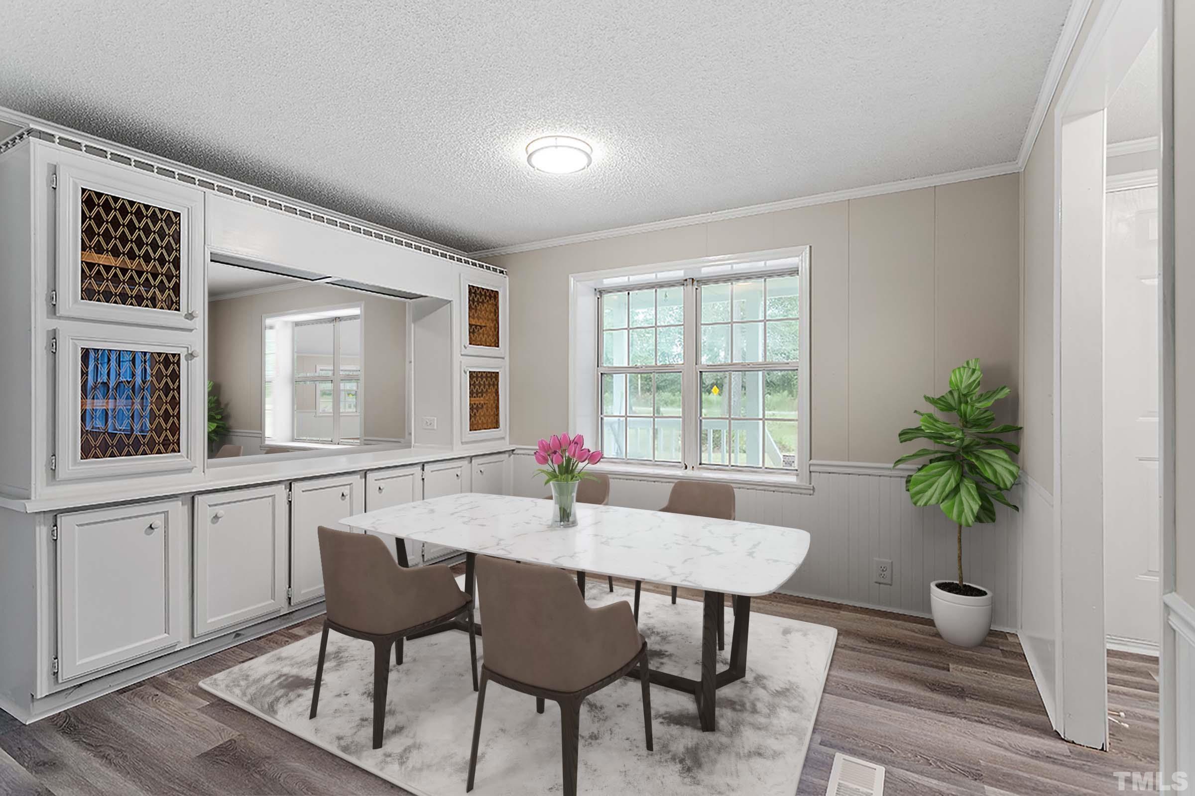 1002 Autry Road Lillington, NC 27546 - Photo 5 of 38 a view of a dining room with furniture and window