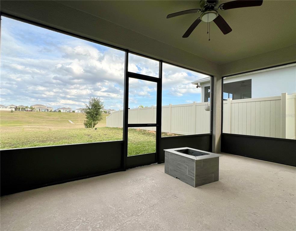 7488 Catania Loop Clermont, FL 34714 - Photo 15 of 22 a living room with a large window