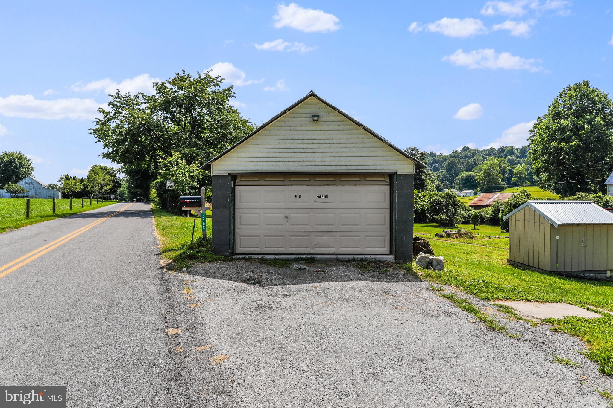 2402 Harpers Ferry Road Sharpsburg, MD 21782 - Photo 17 of 60 Detached single car garage.
