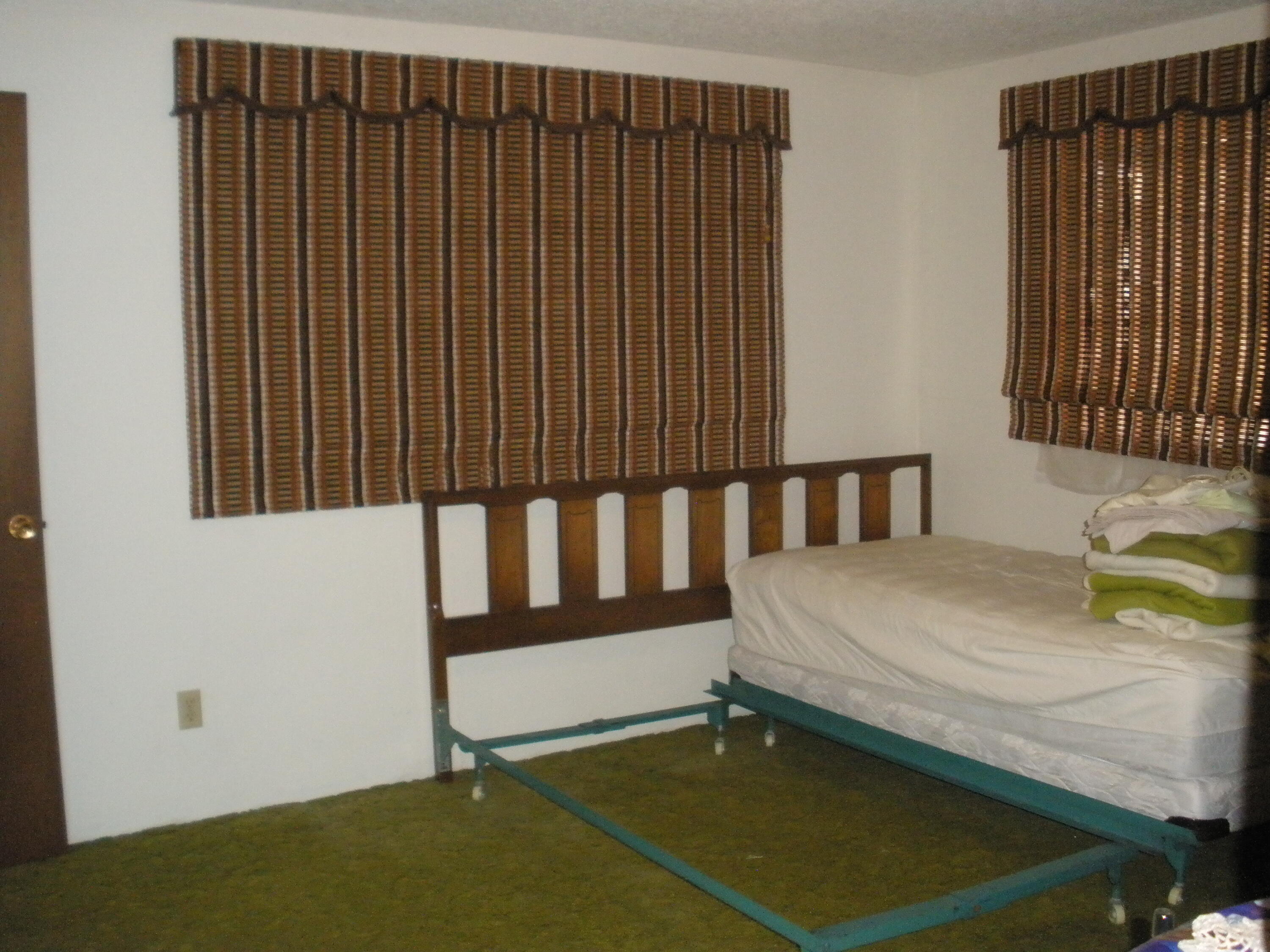 2361 Delta Waters Road Medford, OR 97504 - Photo 7 of 13 Master bedroom. Seller had a king size bed.