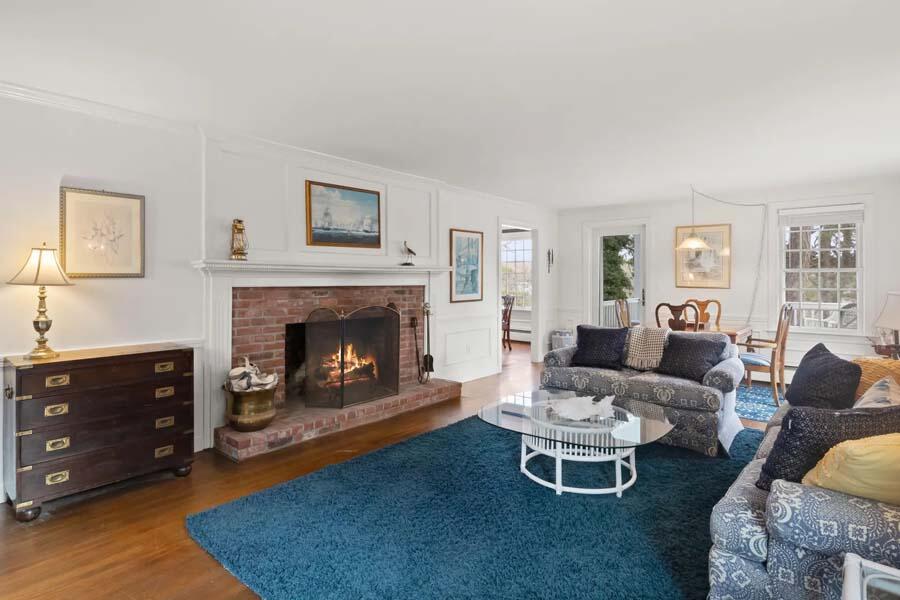 17 Soundview Road Harwich, MA 02645 - Photo 15 of 37 a living room with furniture and a fireplace