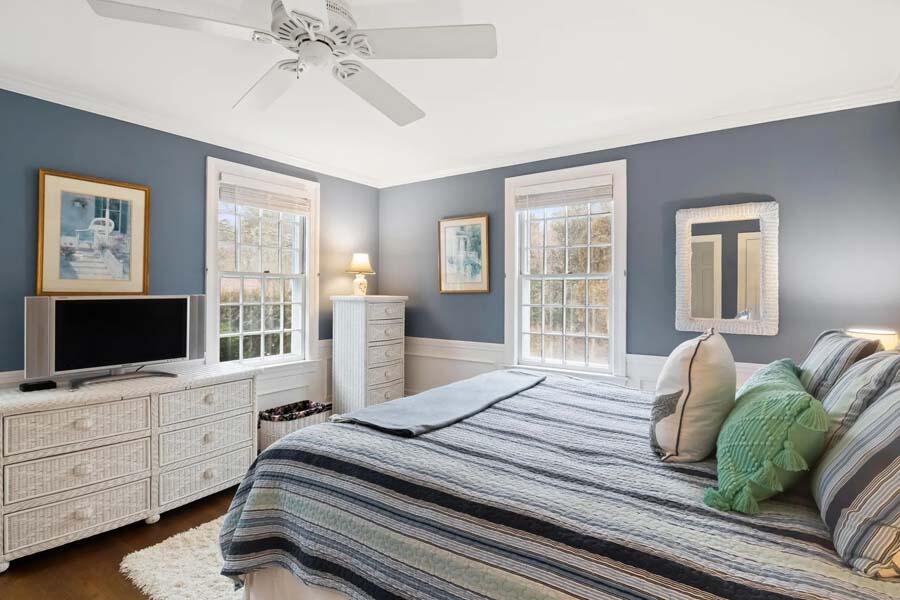 17 Soundview Road Harwich, MA 02645 - Photo 23 of 37 a bedroom with a bed window and flat screen tv