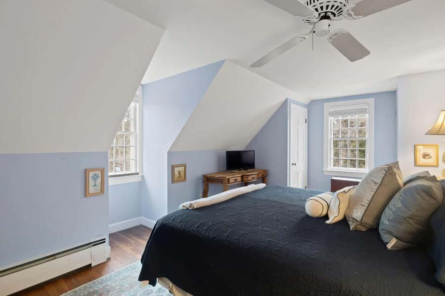 17 Soundview Road Harwich, MA 02645 - Photo 25 of 37 a bed room with a bed mirror and a window