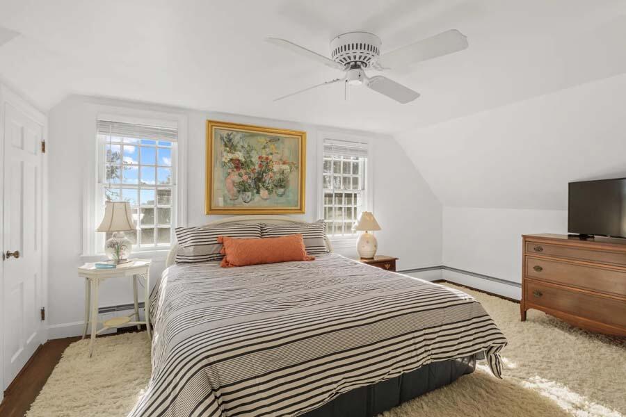17 Soundview Road Harwich, MA 02645 - Photo 29 of 37 a bedroom with a large bed and a tv