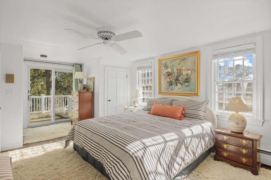 17 Soundview Road Harwich, MA 02645 - Photo 31 of 37 a bedroom with a large bed and a window
