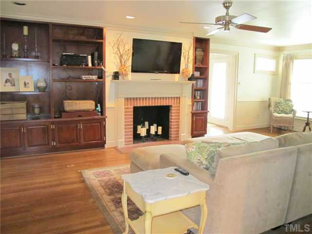 2121 Coley Forest Place Raleigh, NC 27607 - Photo 6 of 25 Masonry Fireplace and Built Ins