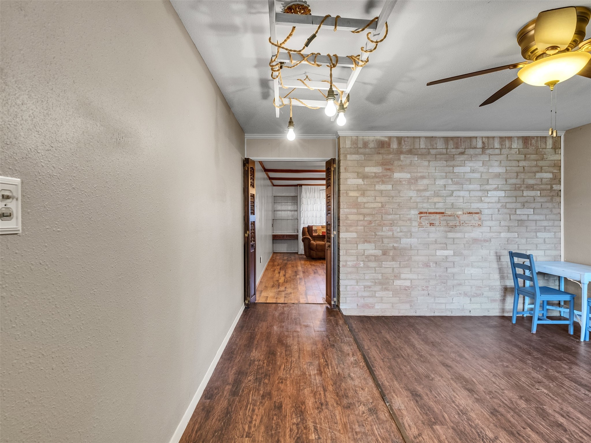 730 Broad Ripple Drive Houston, TX 77336 - Photo 2 of 28 a hallway with wooden floor