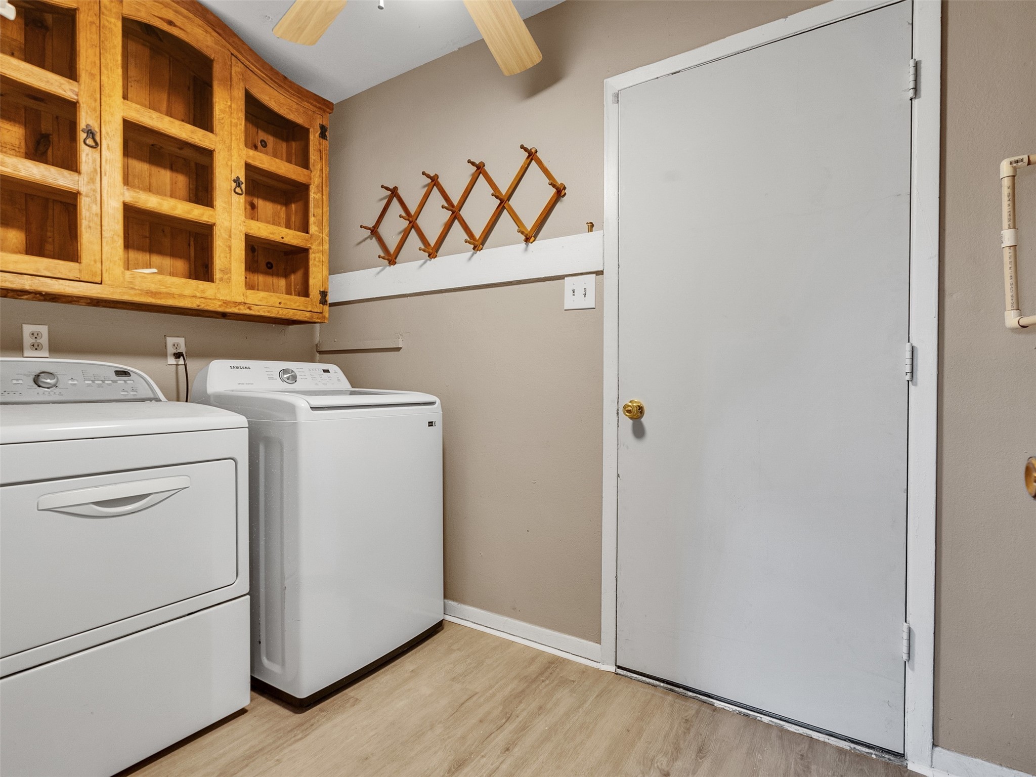 730 Broad Ripple Drive Houston, TX 77336 - Photo 21 of 28 a view of a storage & utility room with a washer dryer