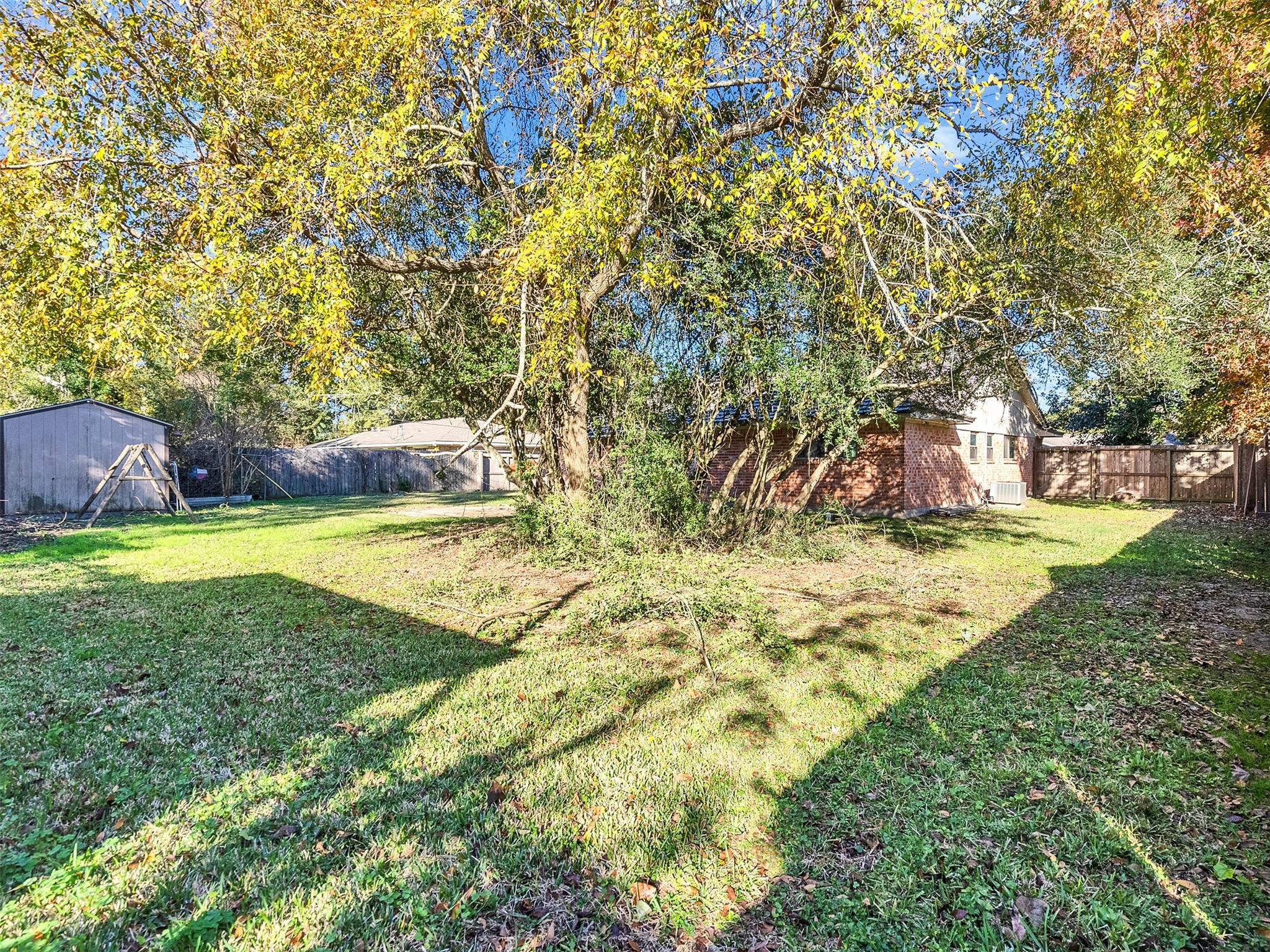 730 Broad Ripple Drive Houston, TX 77336 - Photo 23 of 28 a view of yard with swimming pool and green space
