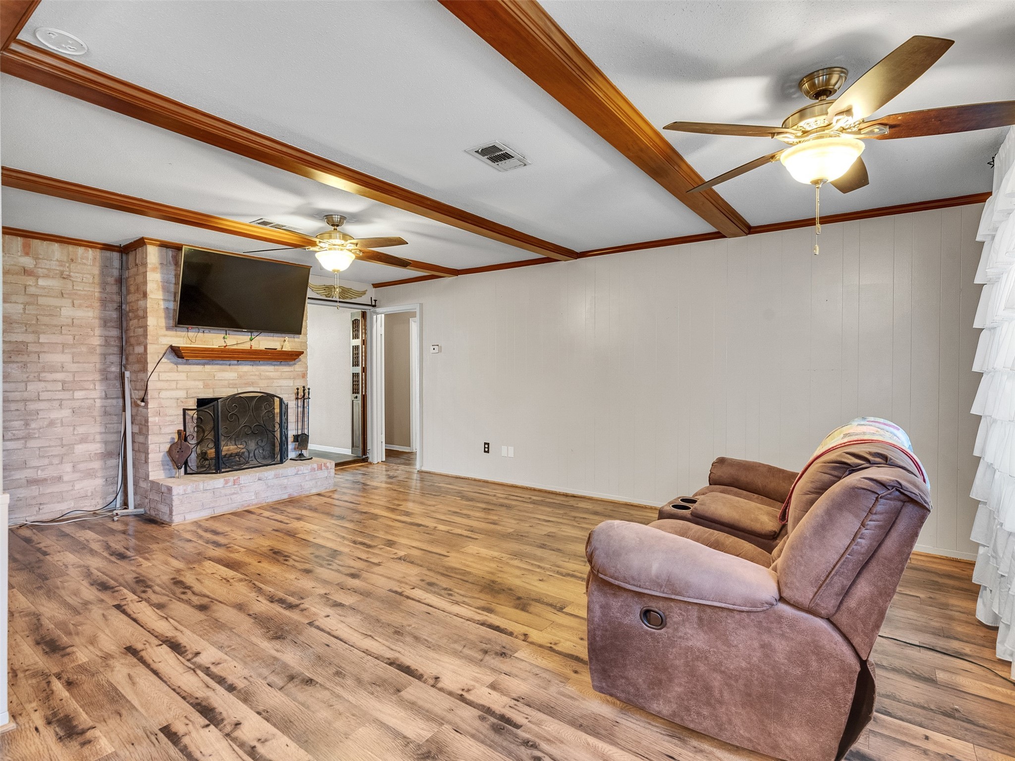 730 Broad Ripple Drive Houston, TX 77336 - Photo 7 of 28 a room with furniture and a fireplace