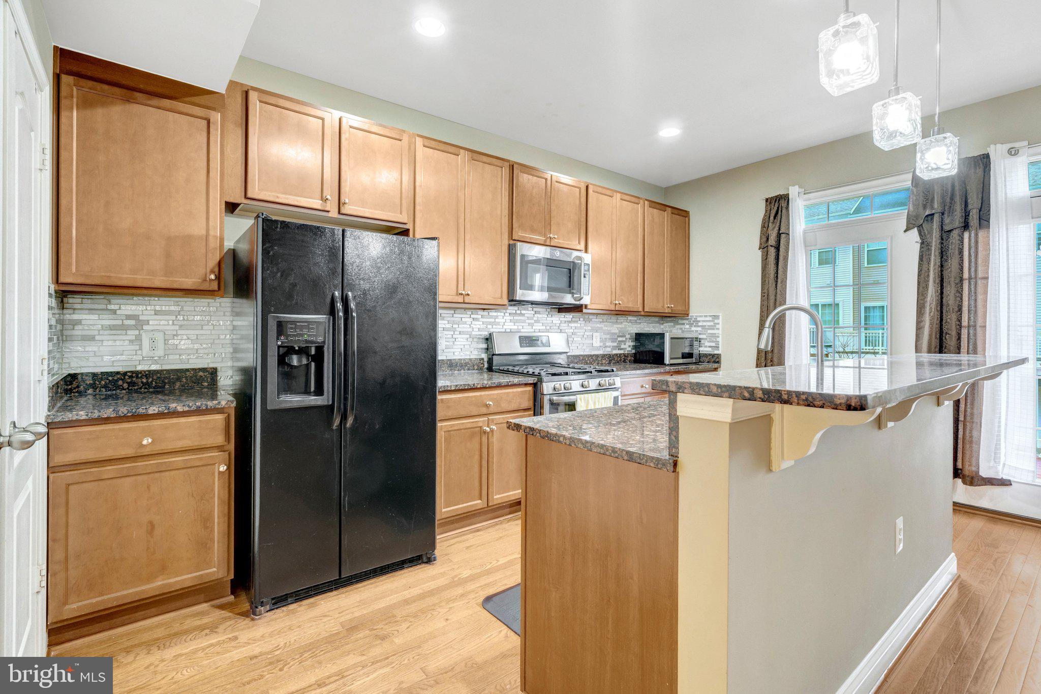 4302 Potomac Highlands Circle Triangle, VA 22172 - Photo 9 of 43 Modern kitchen with sleek finishes.