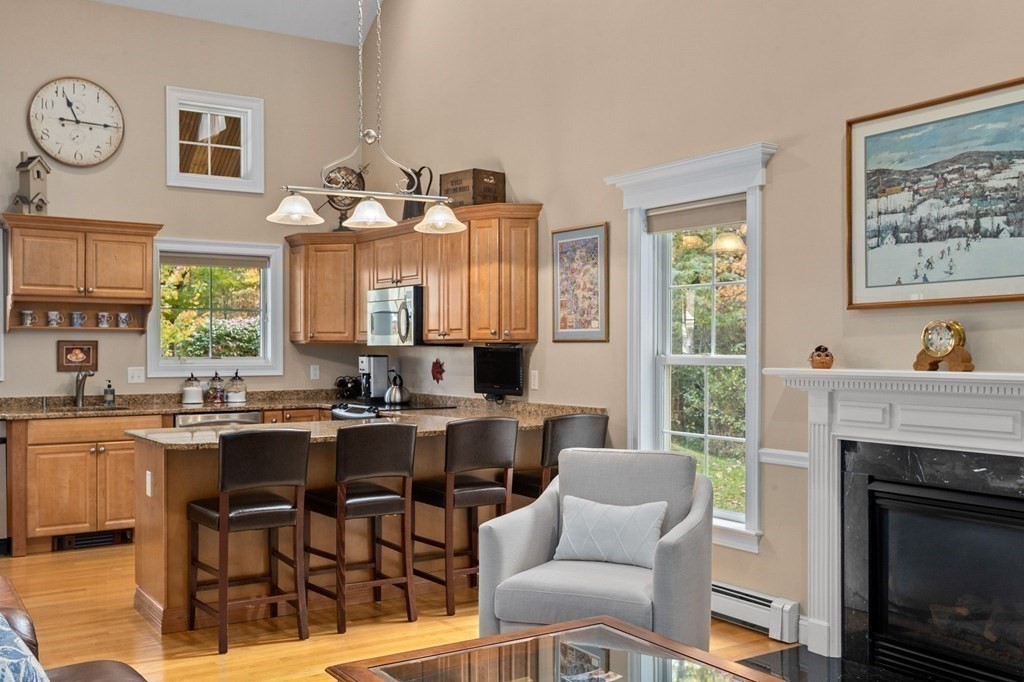 17 Summersweet Circle, Unit 22 Hanover, MA 02339 - Photo 13 of 42 a view of a livingroom with furniture and a fireplace