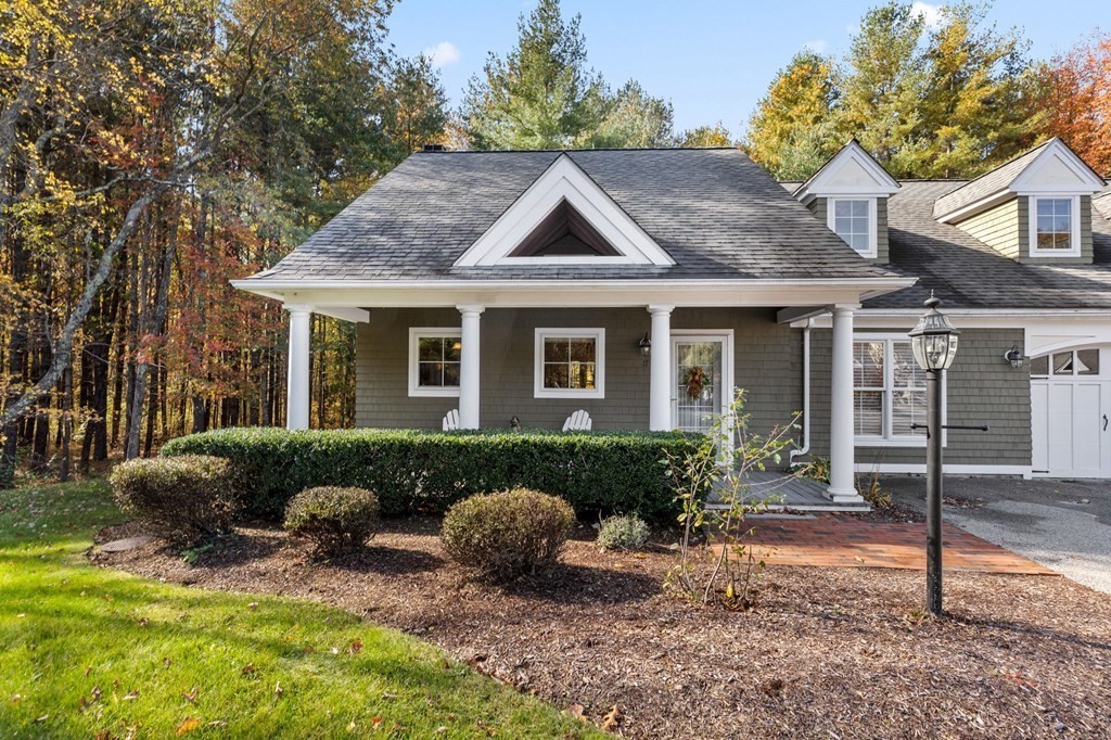 17 Summersweet Circle, Unit 22 Hanover, MA 02339 - Photo 2 of 42 a view of house with a yard and plants